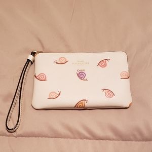 Coach Corner Zip Wristlet in Snail Print Coated Canvas Color Chalk Multi